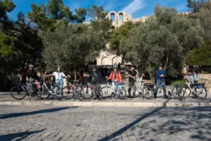 Stone arches of the ancient Herodion Theatre in Athens seen from the Dionysiou Areopagitou pedestrian promenade.