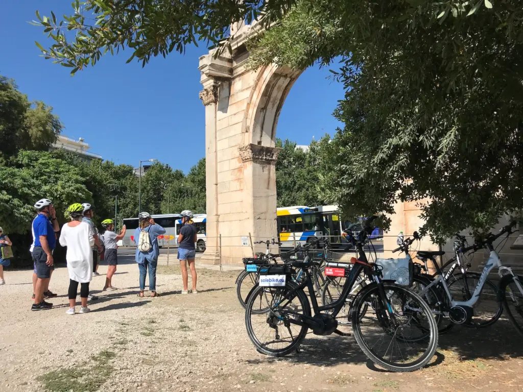 riders with parked eBikes at Hadrian's arch