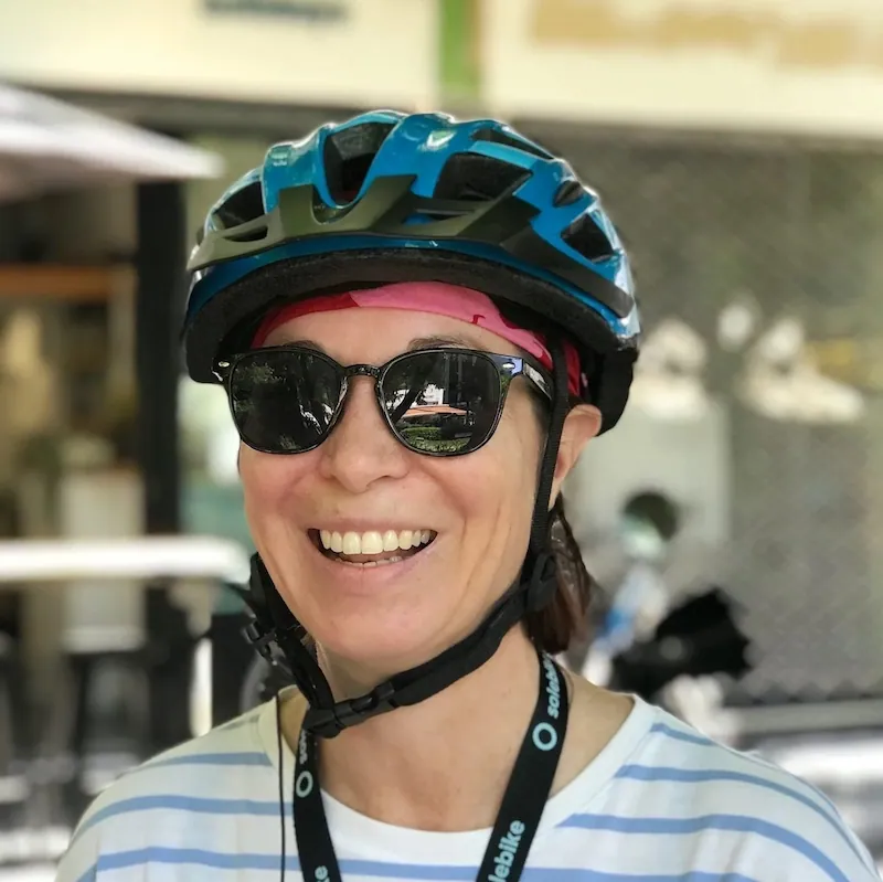 Alex, Solebike tour curator, wearing a helmet in Athens
