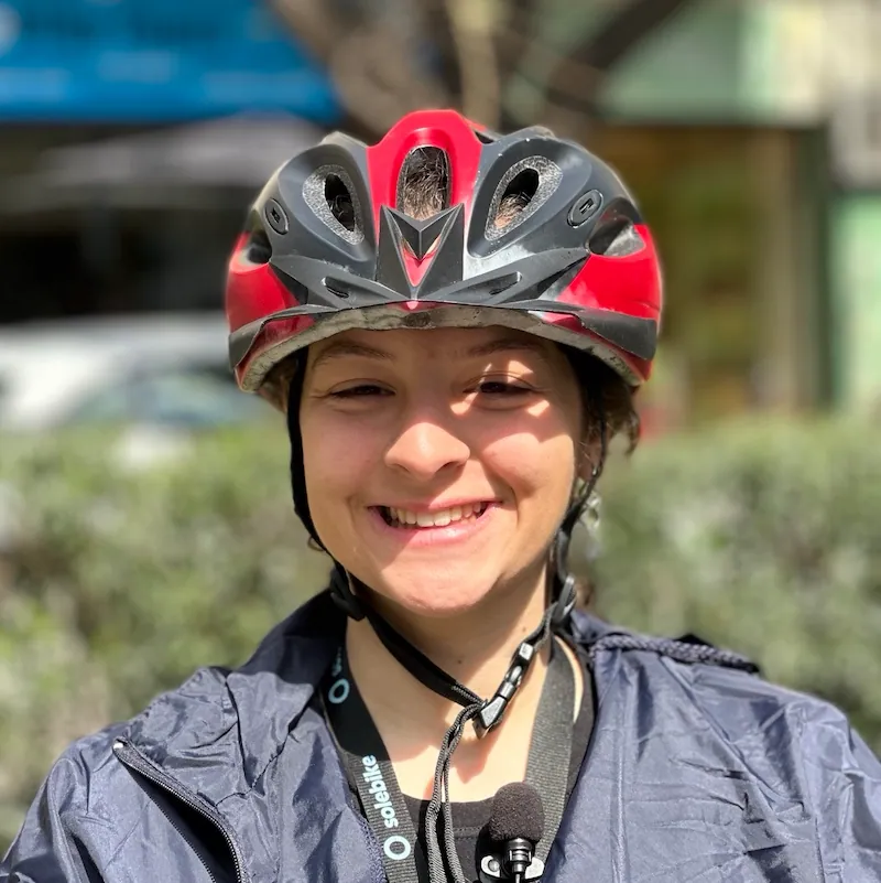 Charis, Solebike tour curator, wearing a helmet in Athens