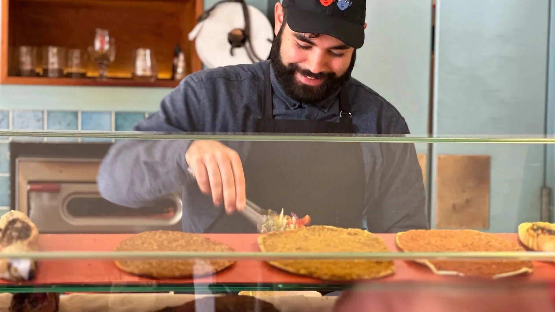 Greek street food being prepared for an Athens famous food guide