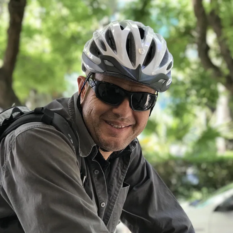 Costas, Solebike co-founder, wearing a bike helmet
