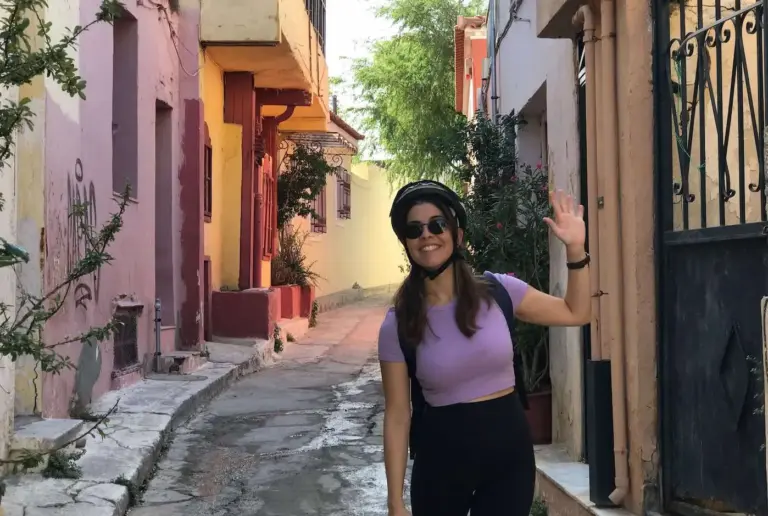 Young female rider in a picturesque Plaka alley during an Athens eBike tour