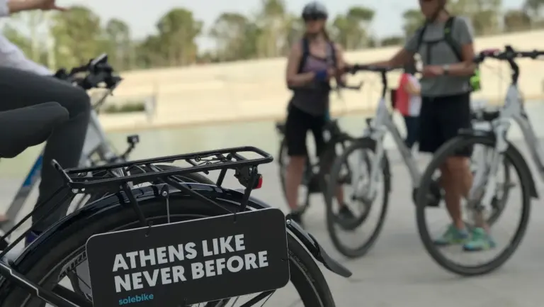 Solebike eBike sign reading Athens Like Never Before during a tour stop in Thissio