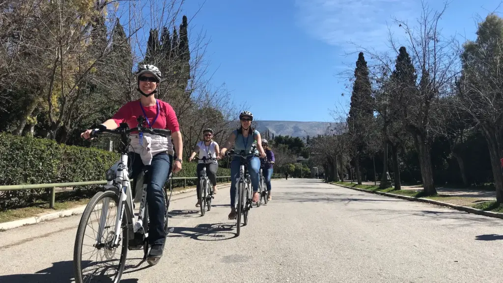 Small group riding eBikes through the Zappeion area in Athens