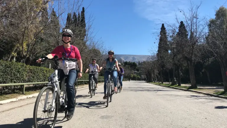 Small group riding eBikes through the Zappeion area in Athens