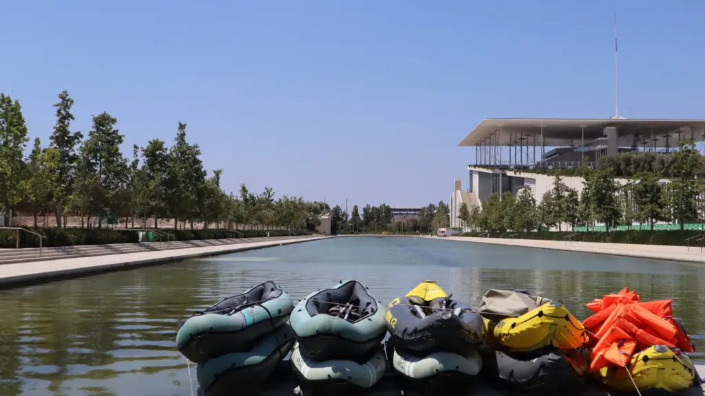 SNFCC canal and modern cultural center building on the Athens Riviera Coffee Ride